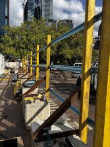 Site Hoardings erected an A class a hoarding along the harbour foreshore in the Rocks, sydney.